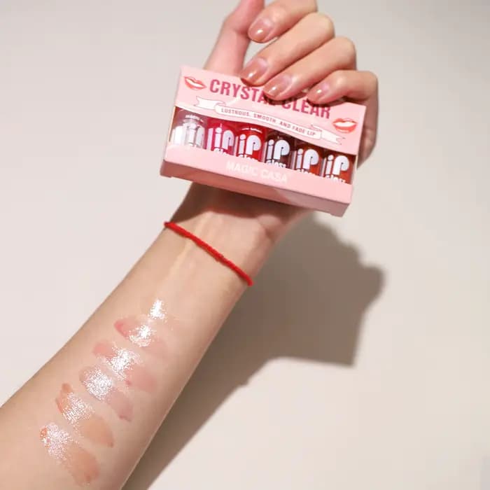 Petite bouteille d'huile hydratante pour les lèvres