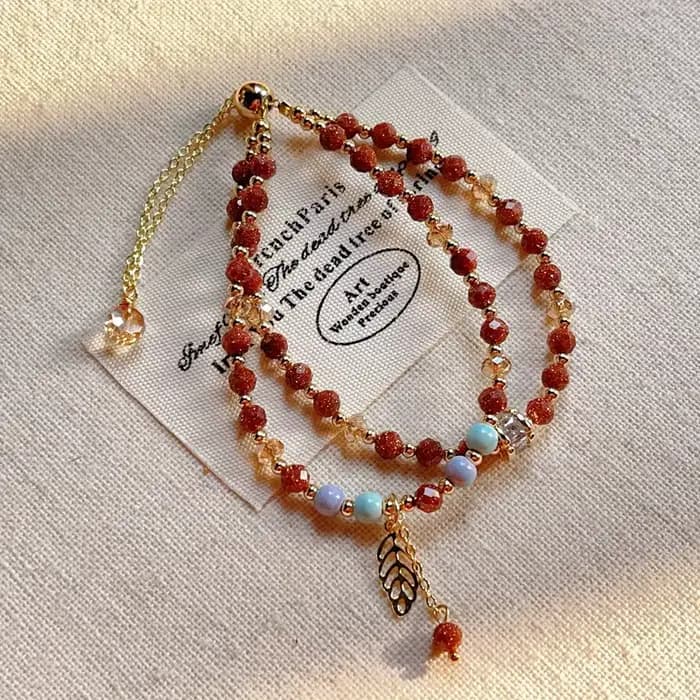 Bracelet à double boucle en pierre de grès rouge doré, pierre arc-en-ciel ultra-fine à facettes, bijou rouge étincelant, porte-bonheur pour elle
