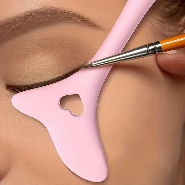 1 guide de maquillage rose - modèle multifonctionnel en forme de cœur pour eye-liner et rouge à lèvres, un outil d'application rapide et facile pour les débutants