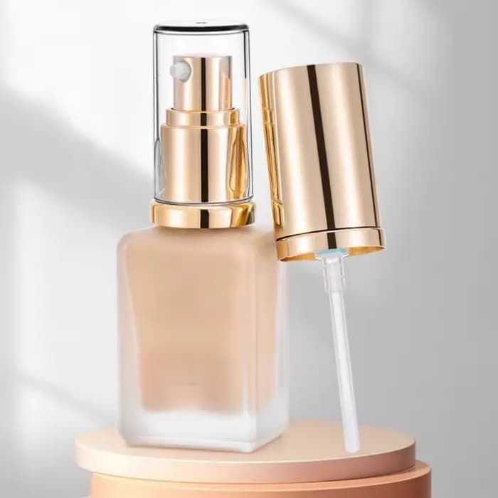 Tête de pompe pour fond de teint liquide DW