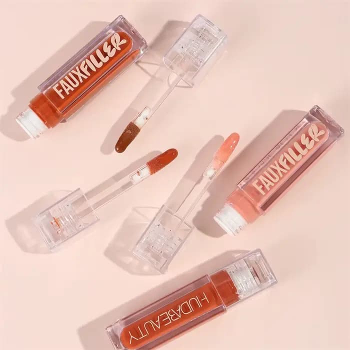 Huda Beauty Faux remplissage brillant Non collant