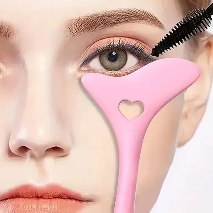 1 guide de maquillage rose - modèle multifonctionnel en forme de cœur pour eye-liner et rouge à lèvres, un outil d'application rapide et facile pour les débutants