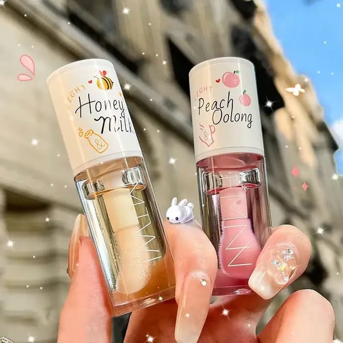 L'huile pour les lèvres au pêche blanche et au miel