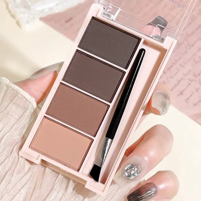 Un ensemble de plateaux de poudre à sourcils de 4 couleurs avec des pinceaux en tons gris et marron mat pour un rendu durable, un remplissage et un s